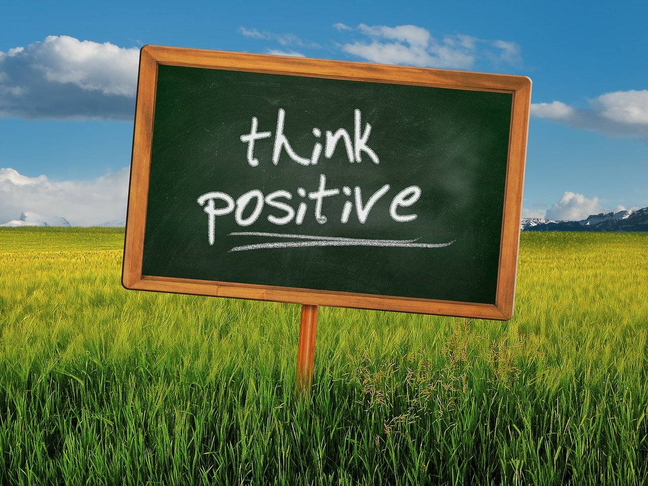 think positive sign in field